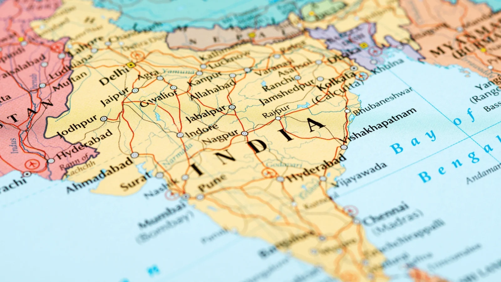 Political map of India showing states, cities and Bay of Bengal coastline in multi-color
